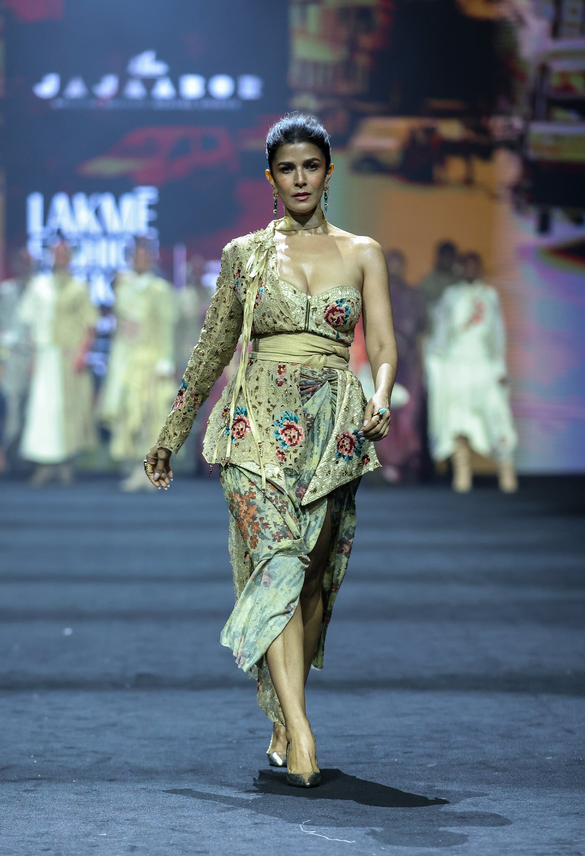 ONE SHOULER EMBROIDERED JACKET WITH CORSET JACKET PAIRED WITH DRAPED SKIRT AND A OB BELT