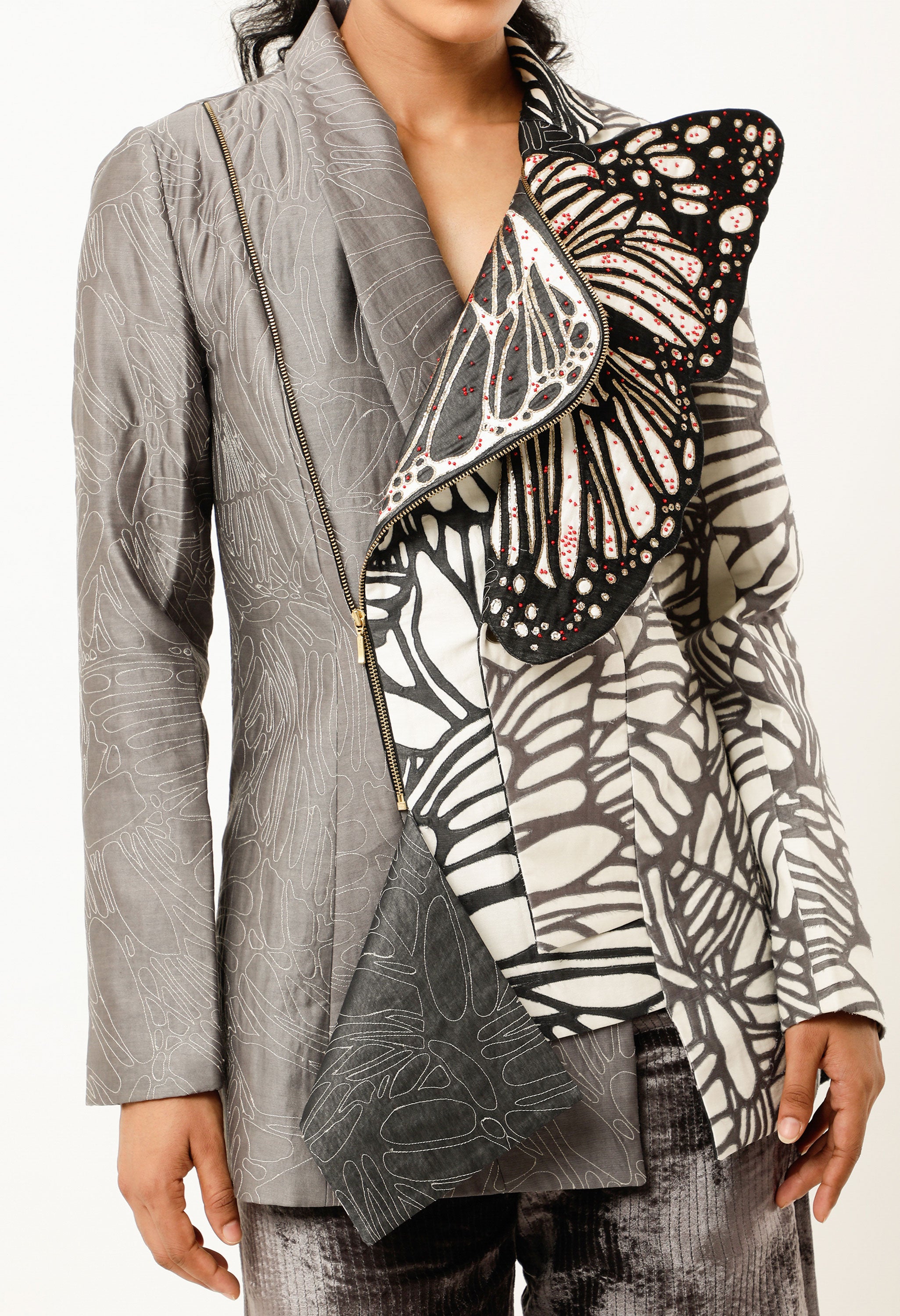 QUILTED JACKET WITH EMBROIDERED BUTTERFLY DETAILING