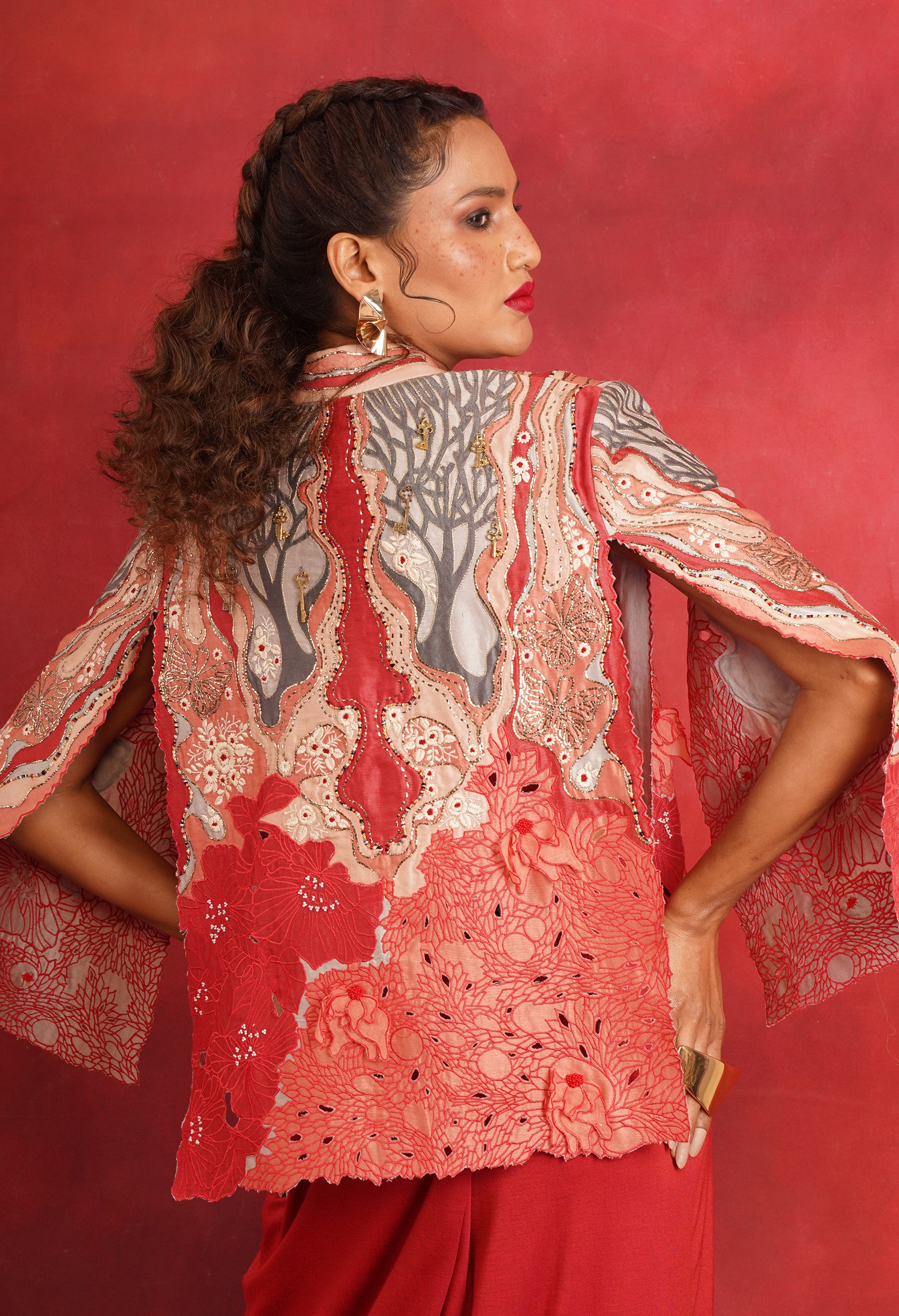 EMBROIDERED CAPE JACKET WITH DRAPED JERSY INNER