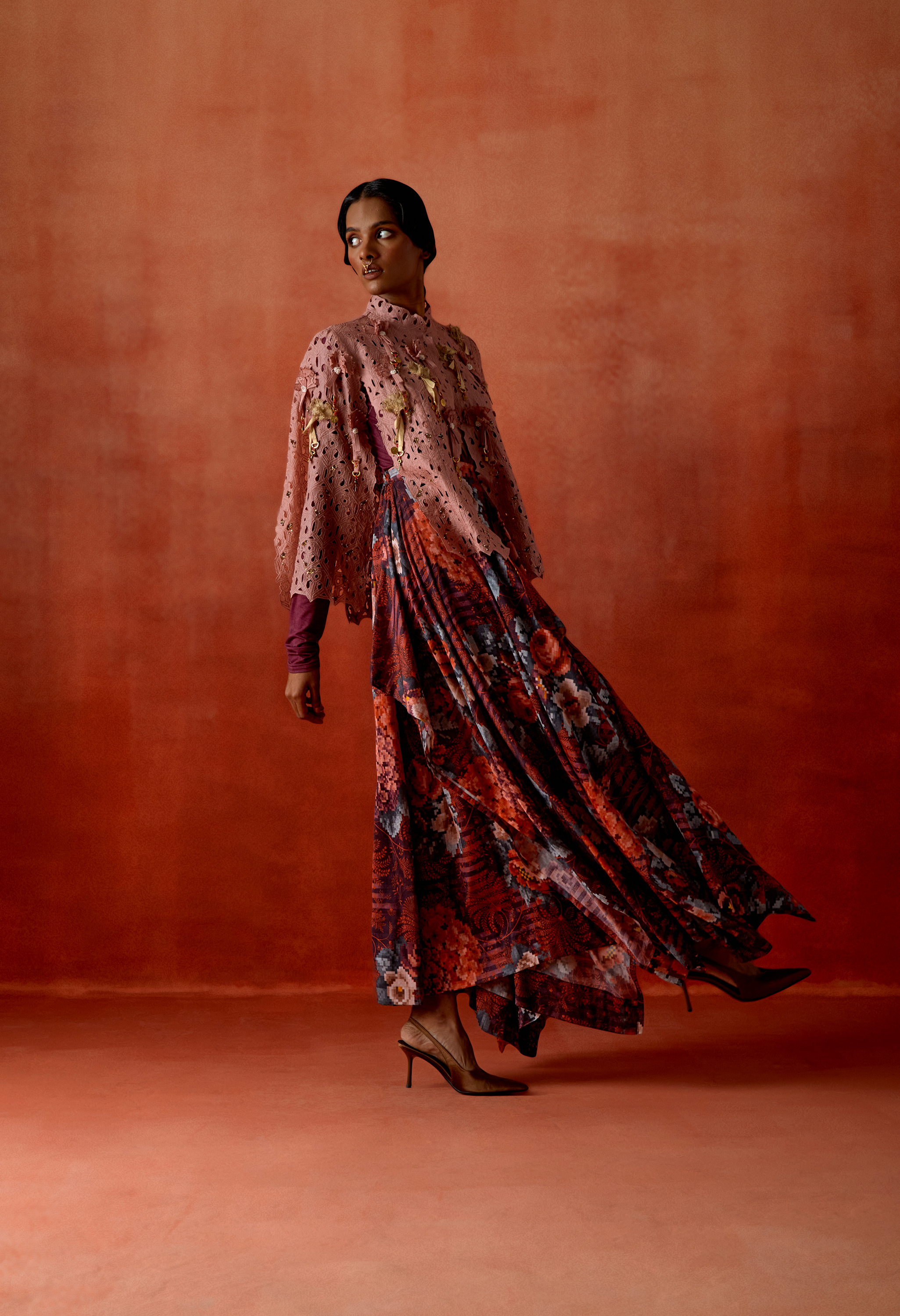 CUTWORK CAPE WITH DRAPED SKIRT