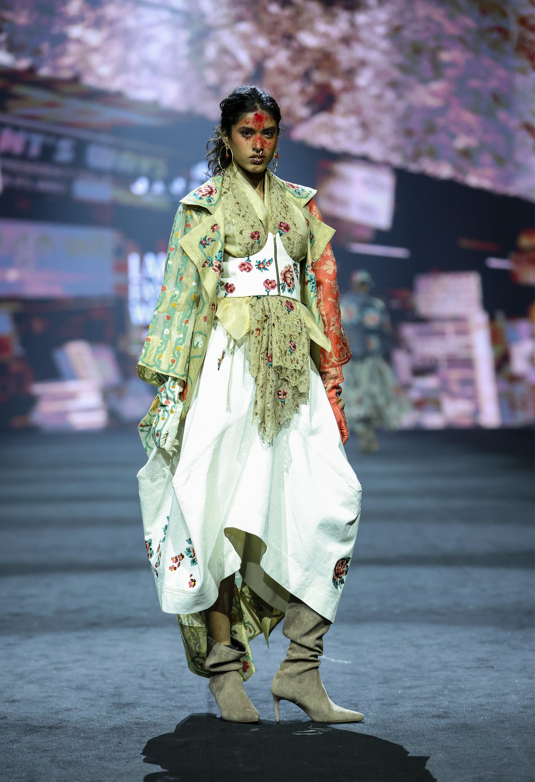 EMB LONG GOLD JACKET WITH DRAPED GOLD TOP + EMB CORSET BELT AND DENIM BARREL SKIRT