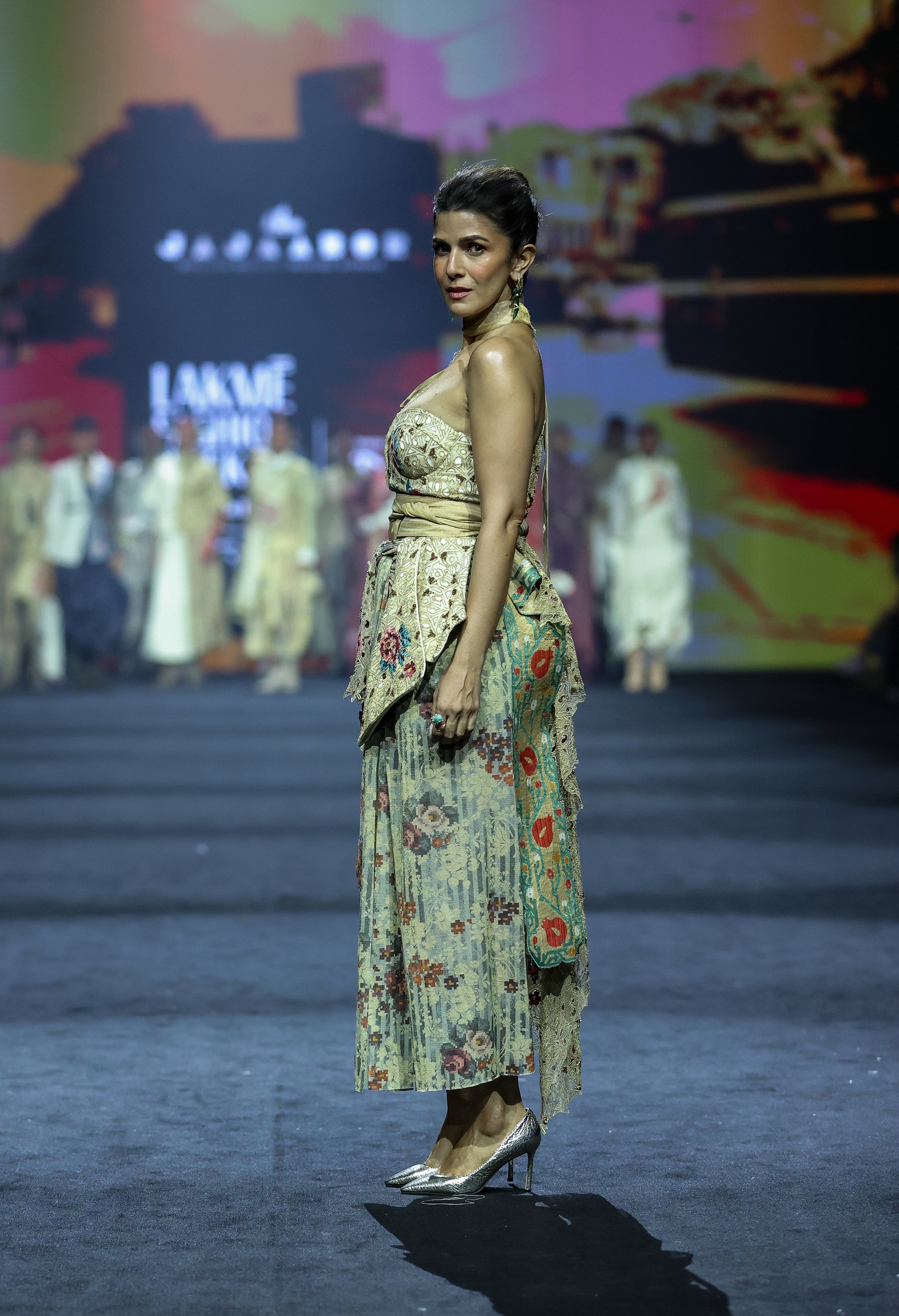 ONE SHOULER EMBROIDERED JACKET WITH CORSET JACKET PAIRED WITH DRAPED SKIRT AND A OB BELT