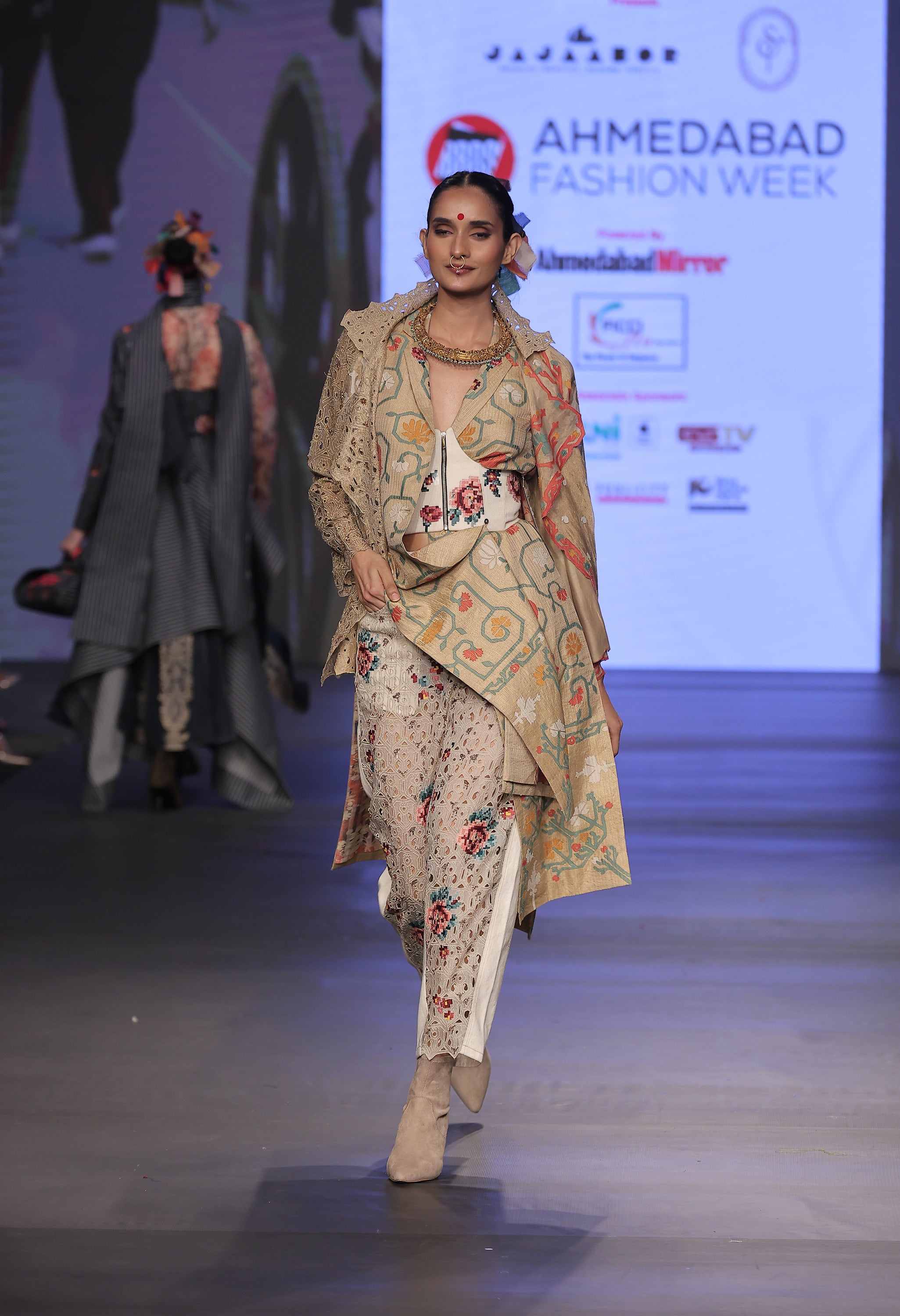 LONG EMB GOLD JACKET COMBINED WITH EMB GOLD SHORT TRENCH + EMB CORSET BELT + EMB GOLD/DENIM BARREL FIT PANTS