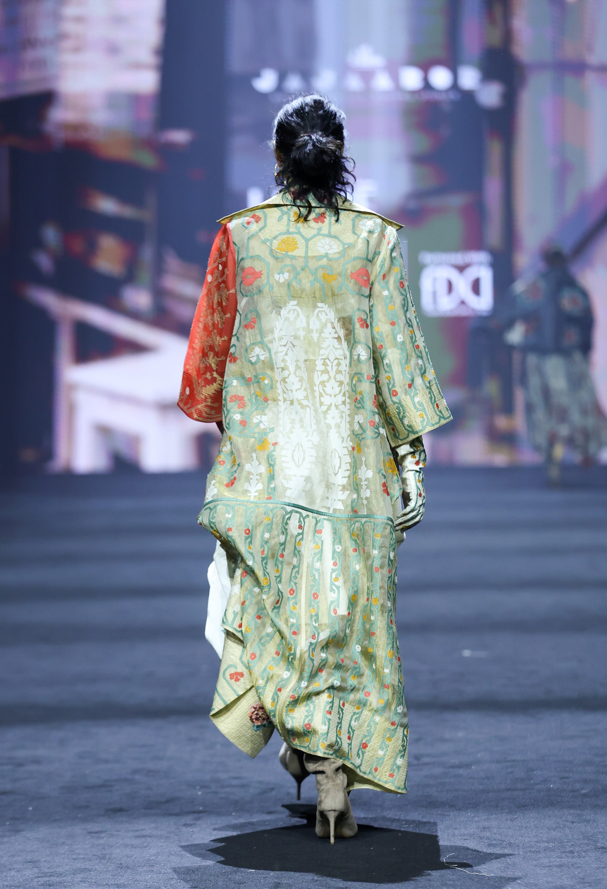 EMB LONG GOLD JACKET WITH DRAPED GOLD TOP + EMB CORSET BELT AND DENIM BARREL SKIRT