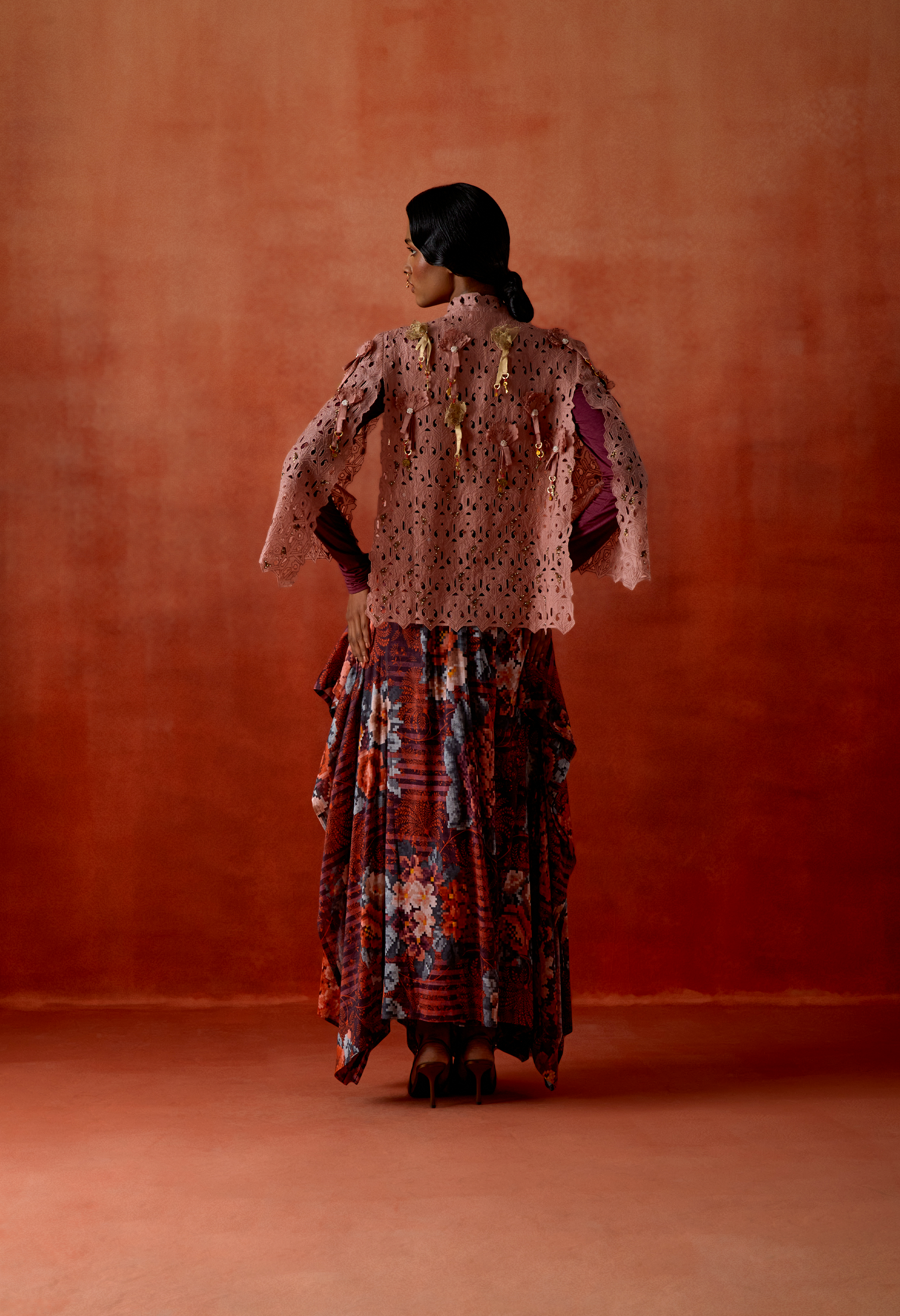 CUTWORK CAPE WITH DRAPED SKIRT